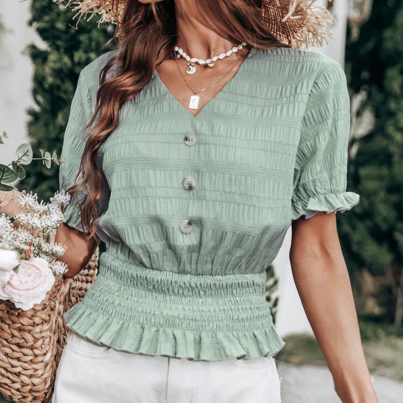 Pleated button-front blouse with peplum