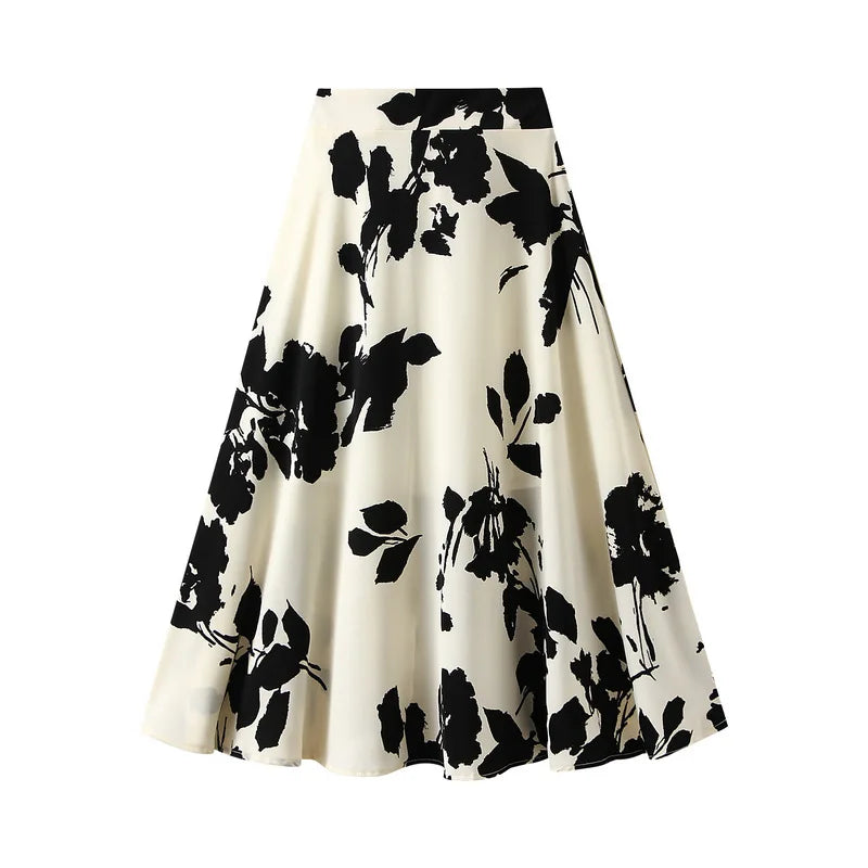 Long pleated skirt with tree branch print