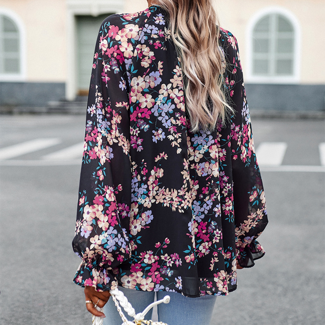 Floral blouse with V-neck and puff sleeves