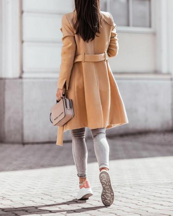 Winter trend: Elegant women's coat with belt