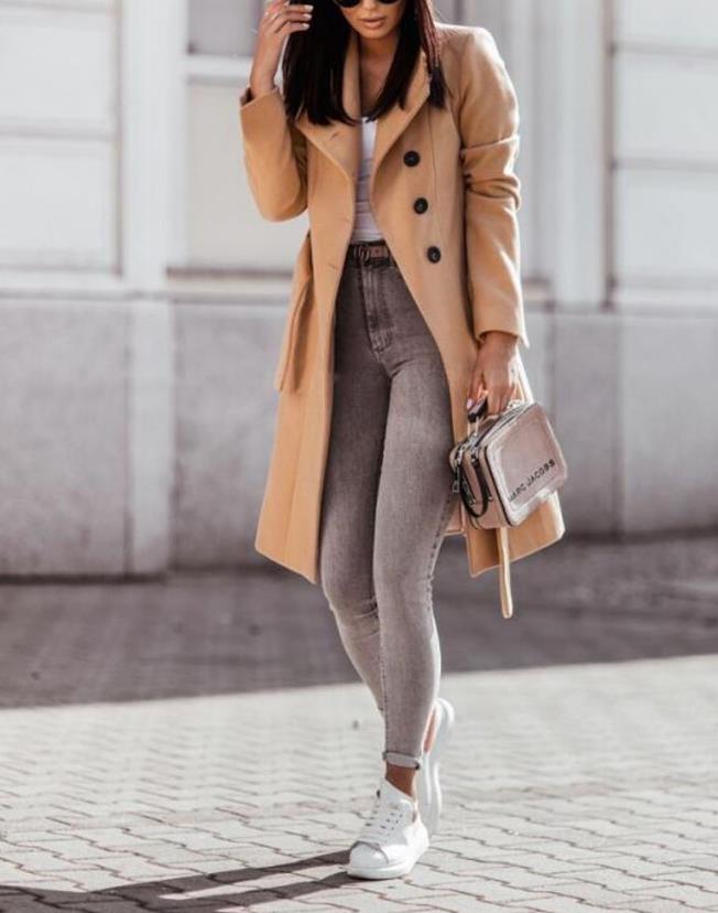 Winter trend: Elegant women's coat with belt