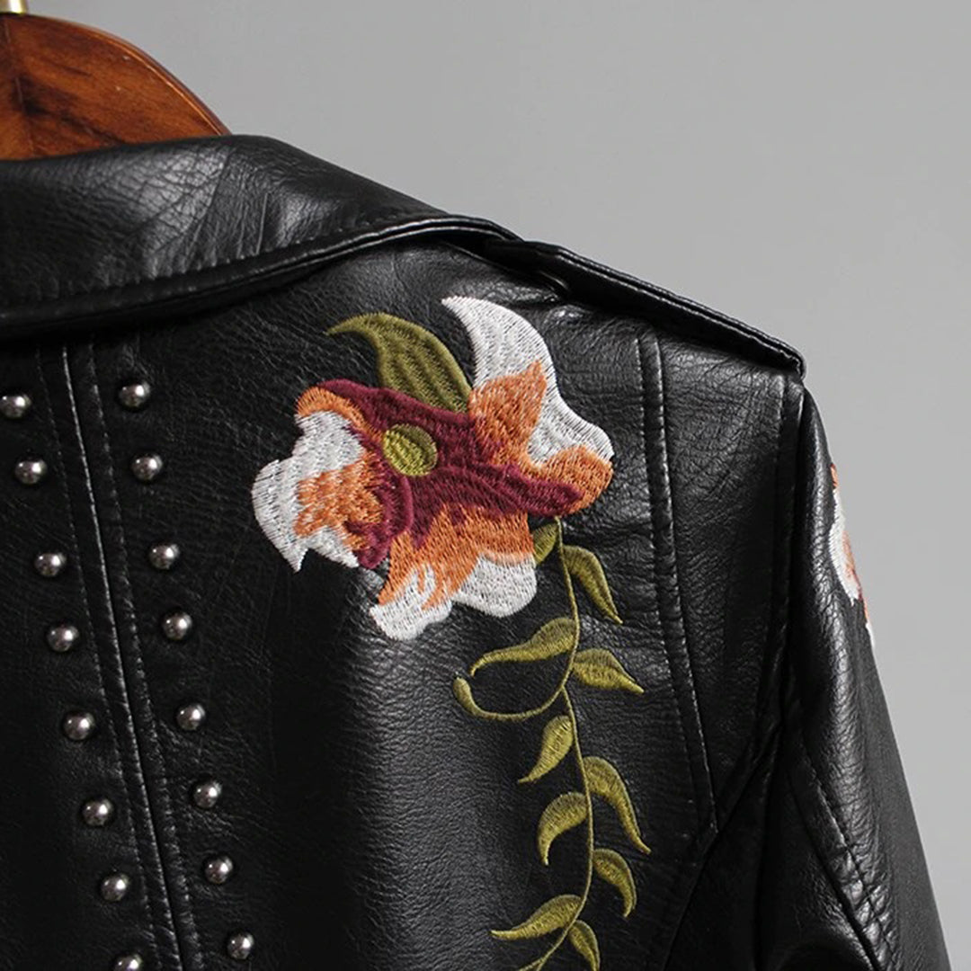 Fashionable faux leather jacket with floral pattern