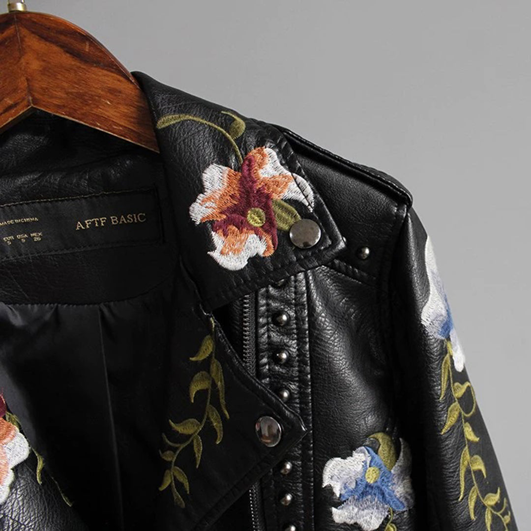 Fashionable faux leather jacket with floral pattern