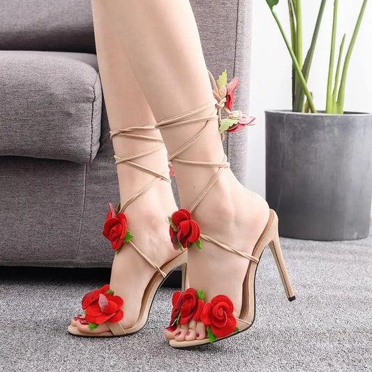 Stiletto sandals with floral appliqués