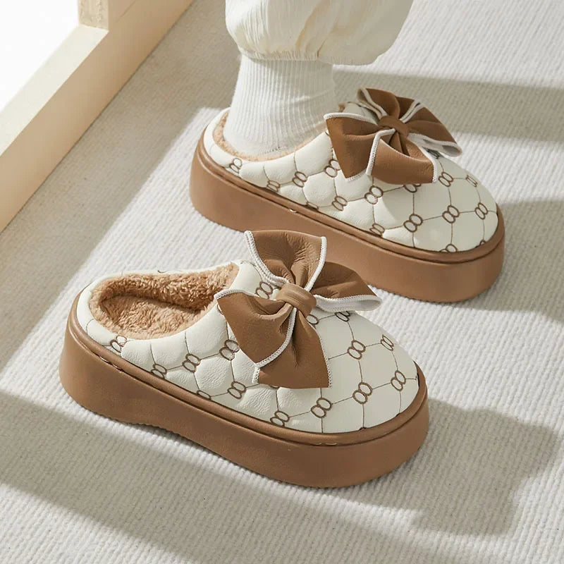 Elegant slippers with decoration and bow