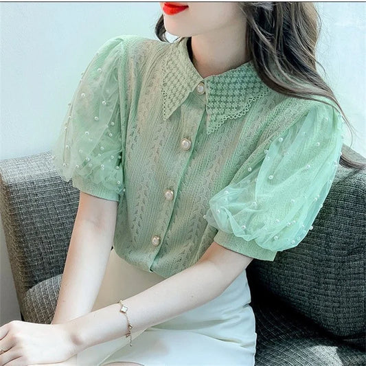 Lace blouse with puff sleeves