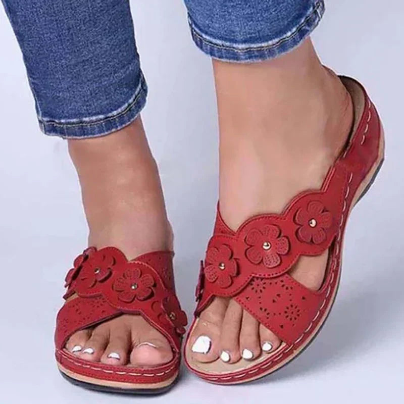 Roman sandals for women with floral embellishment and wedge heel