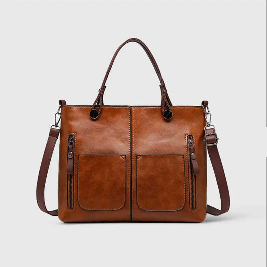 Bag in vegetable leather with multiple compartments