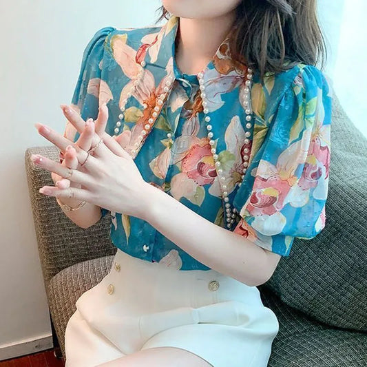 Blouse with floral bead print