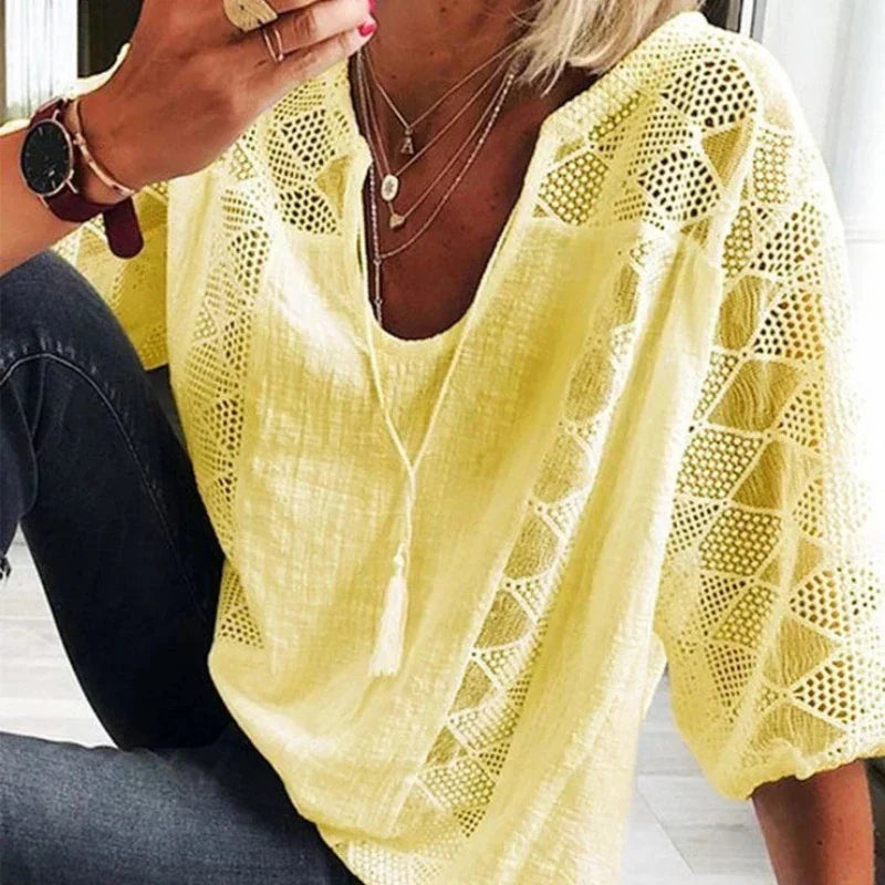 Fashionable lace blouse with V-neckline