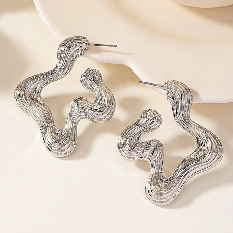 Sculptural wave statement earrings