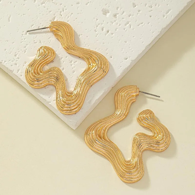 Sculptural wave statement earrings