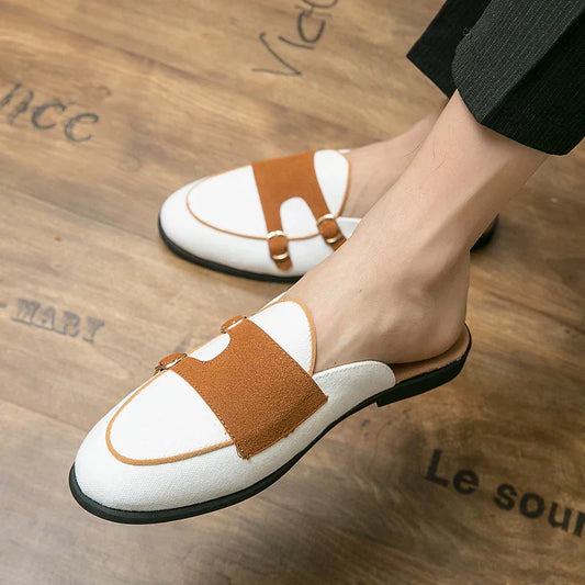 Modern mules with buckles in a two-colour look