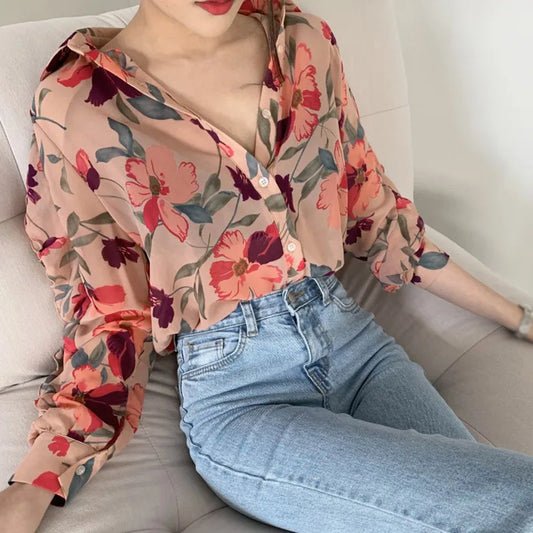 Long-sleeved chiffon blouse with floral V-neckline