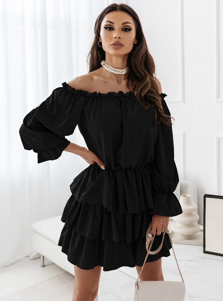 Long off-the-shoulder dress with puff sleeves