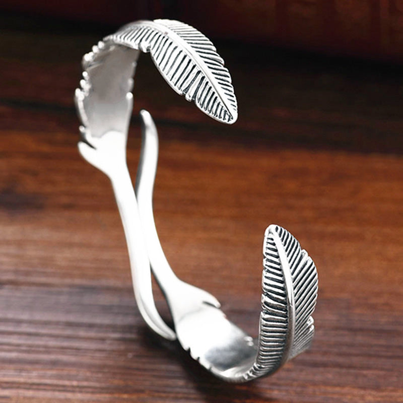 Sterling feather cuff bracelet with openwork design