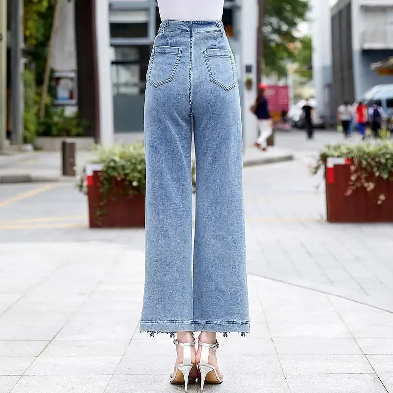 High-waisted jeans with lace patchwork