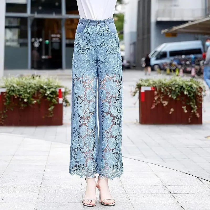 High-waisted jeans with lace patchwork