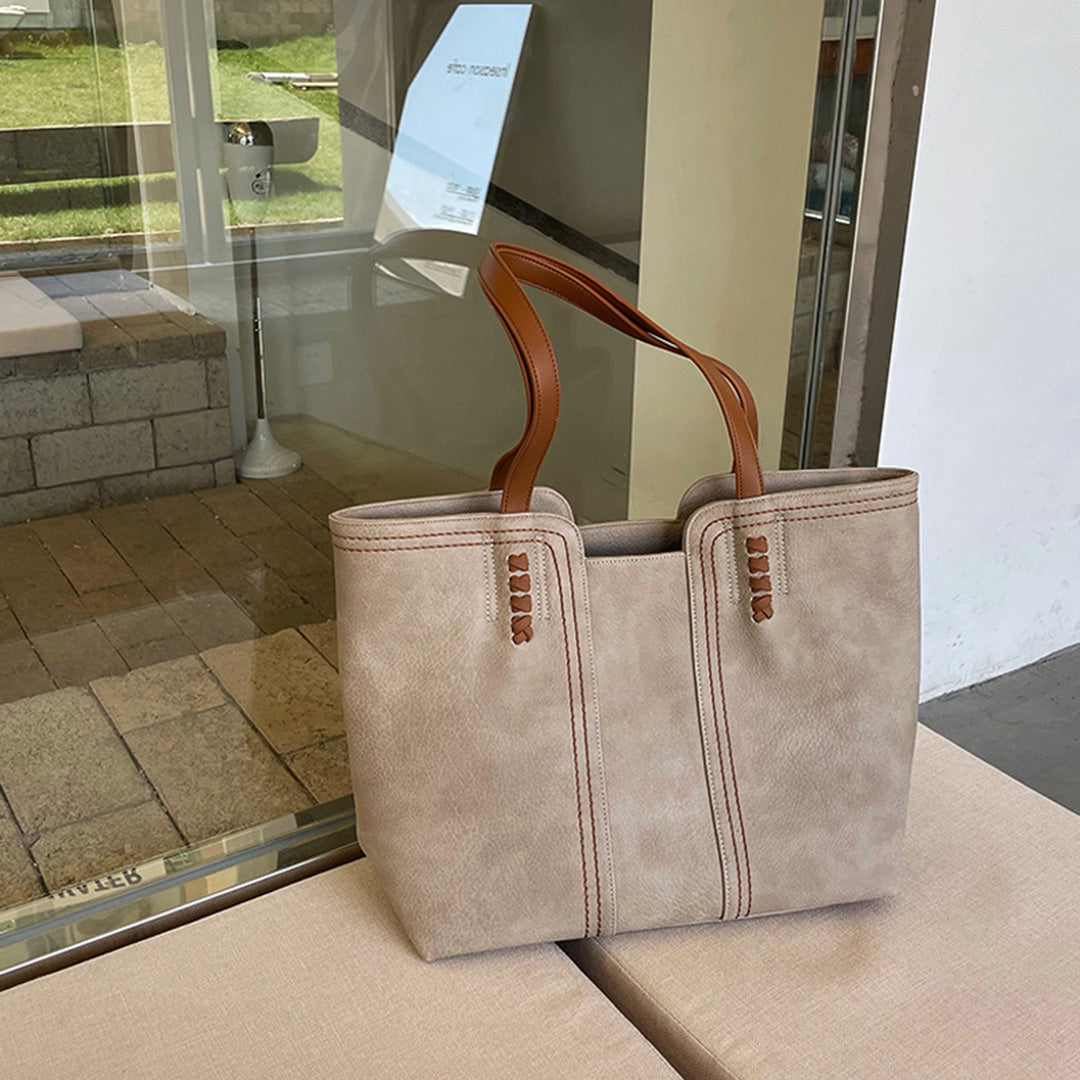 Chic suede carrier bag with contrasting handles