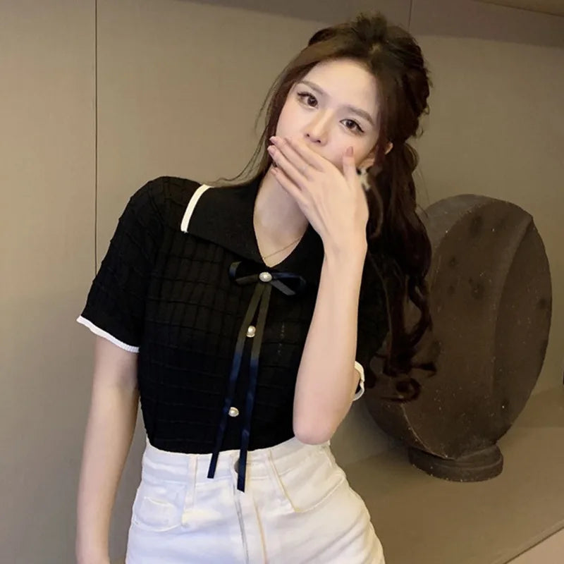 Knitted crop top with lapel collar