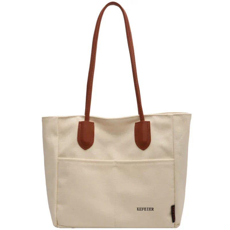 Ladies canvas handbag with PU leather strap and large capacity