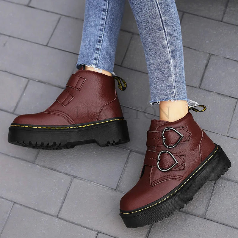 Fashionable ankle boots with heart-shaped buckles