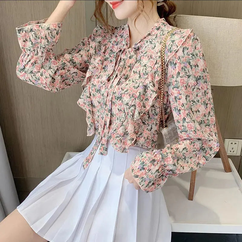 Floral blouse with bow collar