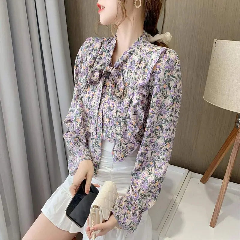 Floral blouse with bow collar