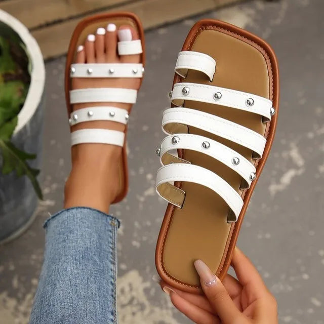 Flat strappy sandals with studs