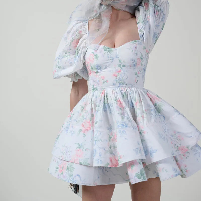 Pastel-coloured dress with floral pattern