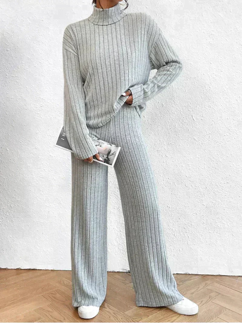 Knitted trousers and sweater with turtleneck for women