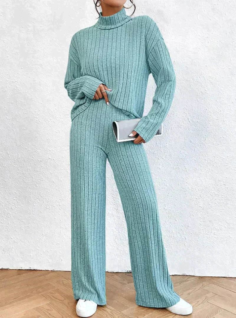 Knitted trousers and sweater with turtleneck for women