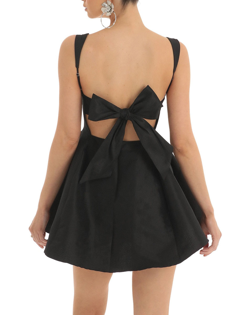 Mini dress with bow and flare