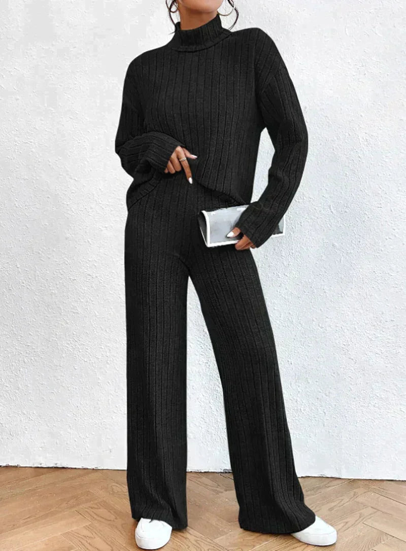 Knitted trousers and sweater with turtleneck for women