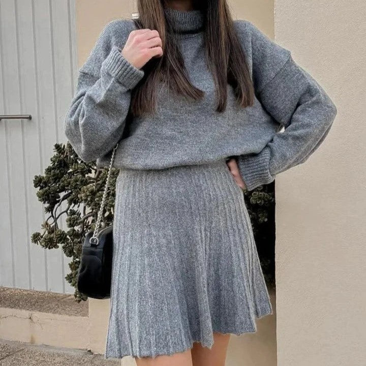 Ribbed turtleneck jumper with crop cut and pleated skirt set