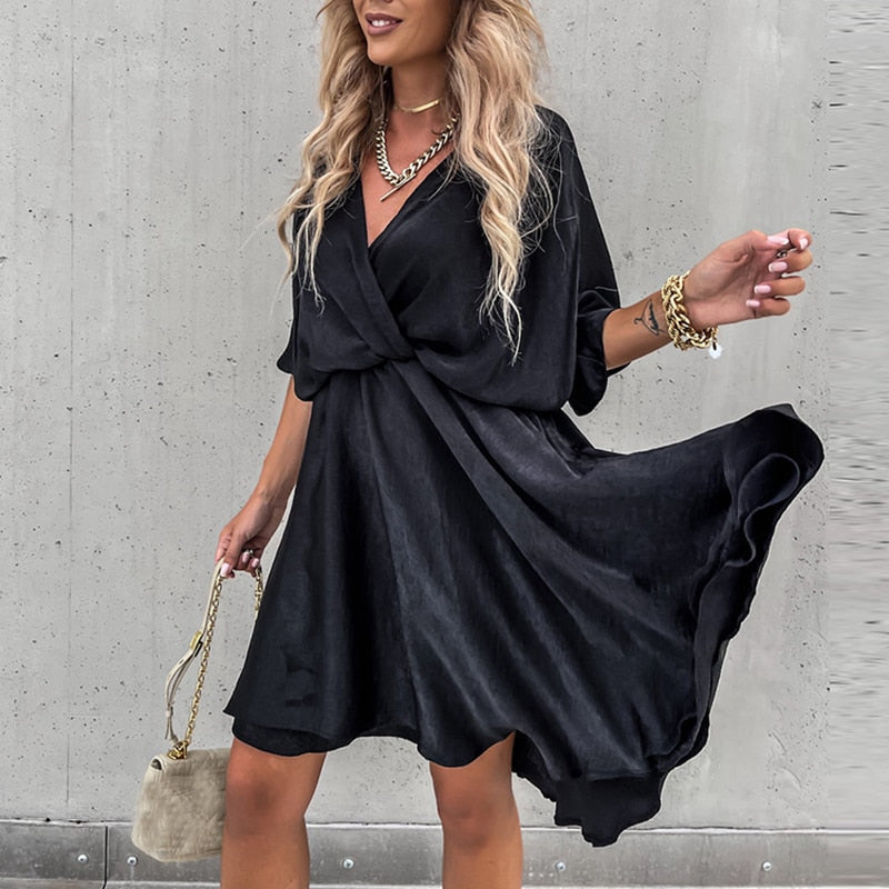 Satin dress with V-neck and short sleeves