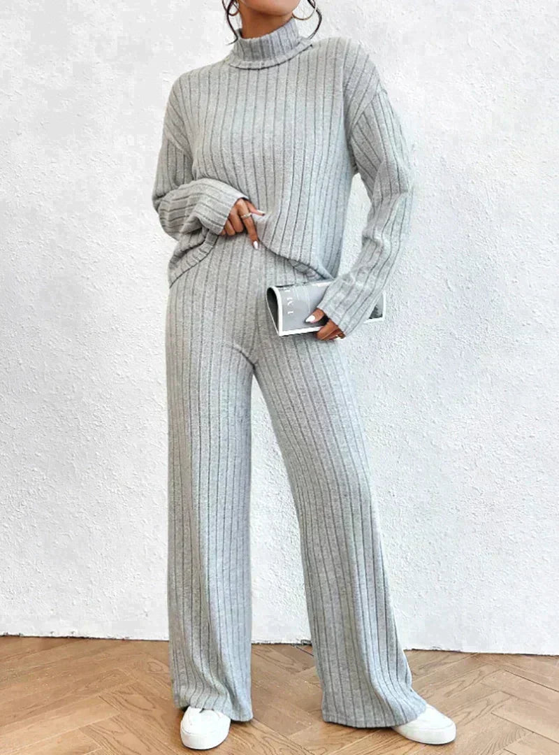 Knitted trousers and sweater with turtleneck for women