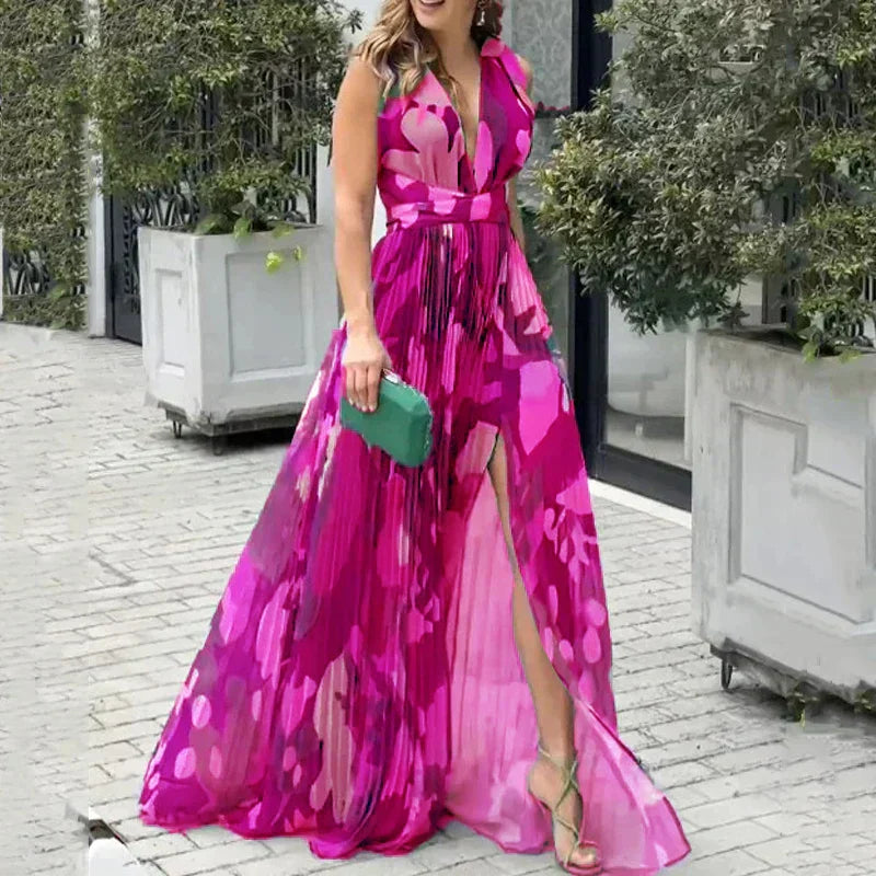 Elegant pink sleeveless backless maxi dress with V-neckline, slit draping and fitted waist