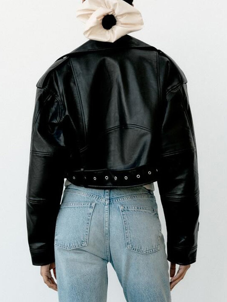 Biker style in vegan leather with belt and zip