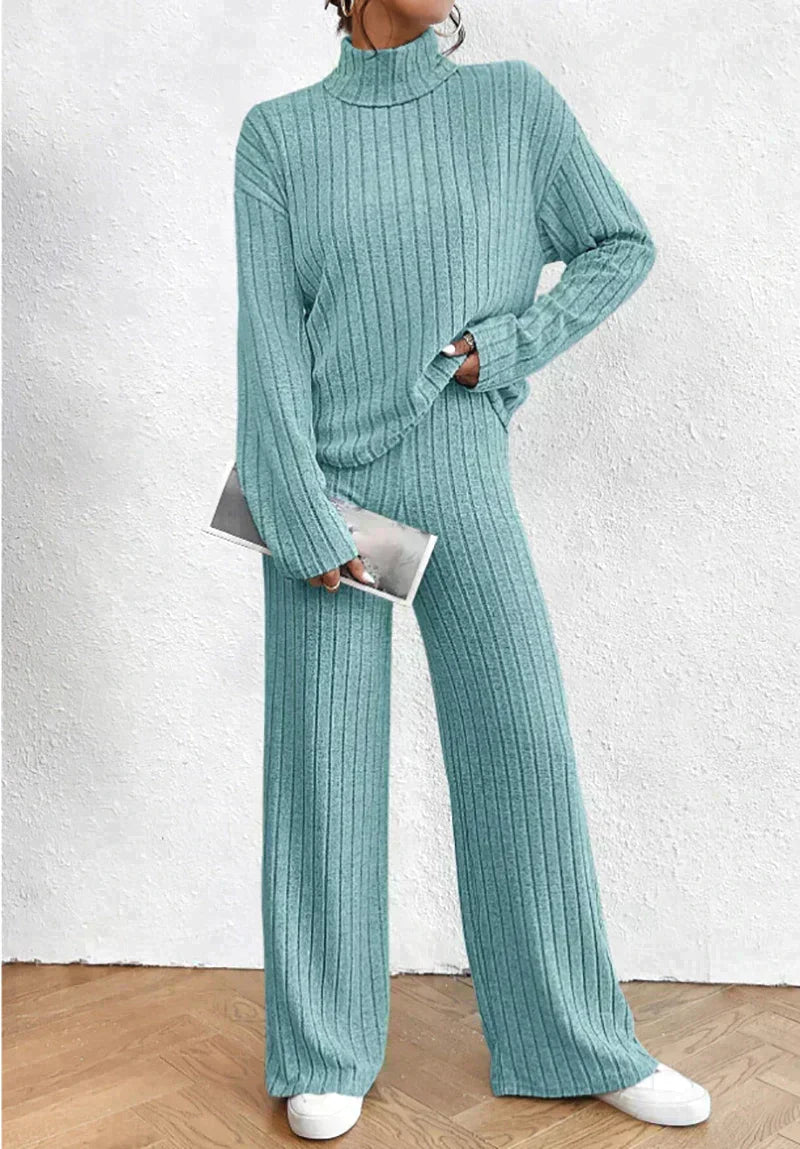 Knitted trousers and sweater with turtleneck for women