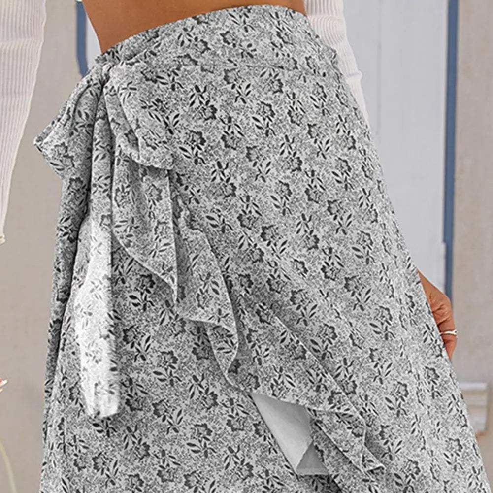 Flowing midi skirt with lace overlay