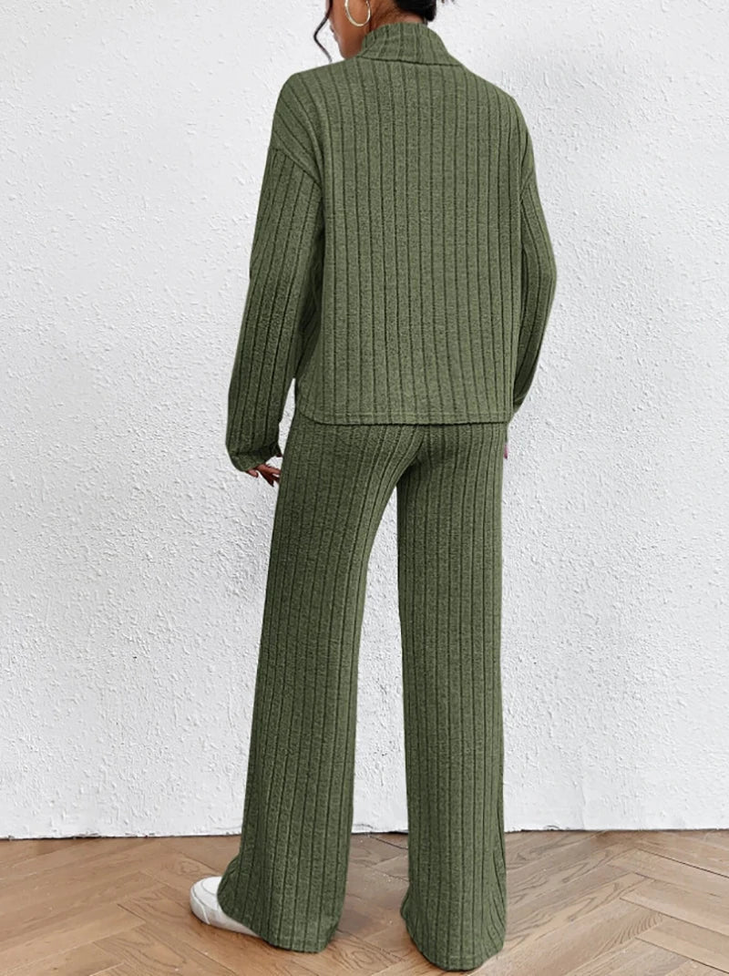 Knitted trousers and sweater with turtleneck for women