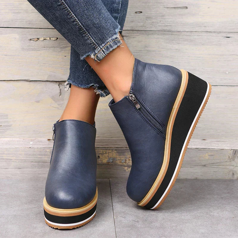 Stylish ankle boots with zip and platform