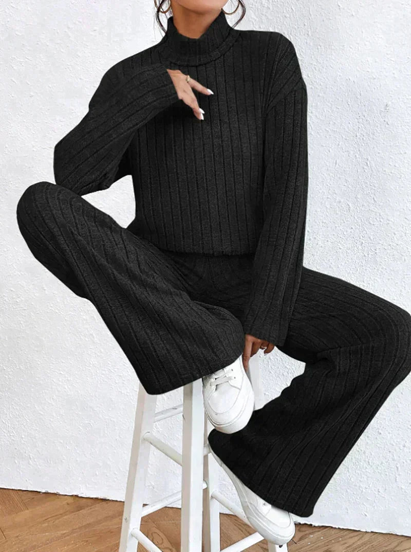 Knitted trousers and sweater with turtleneck for women