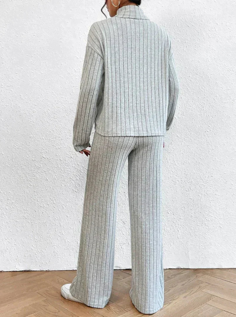 Knitted trousers and sweater with turtleneck for women