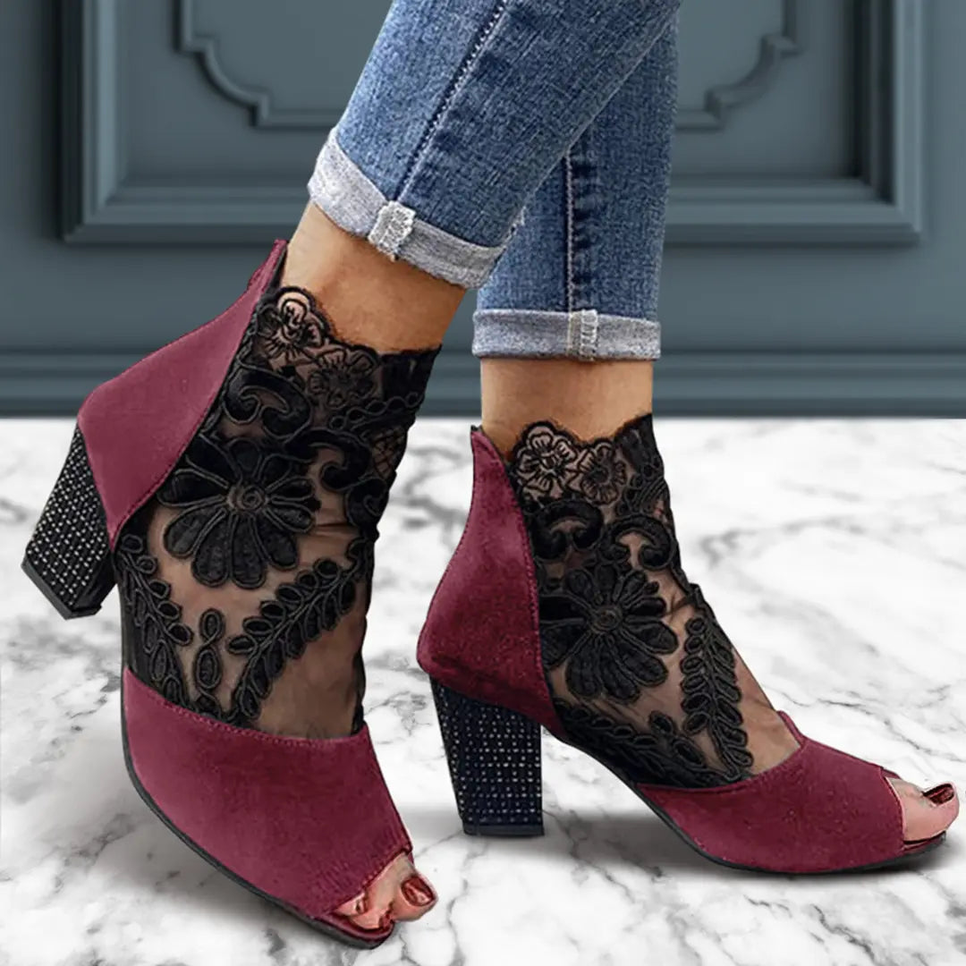 Luxurious black ankle high heel with lace details