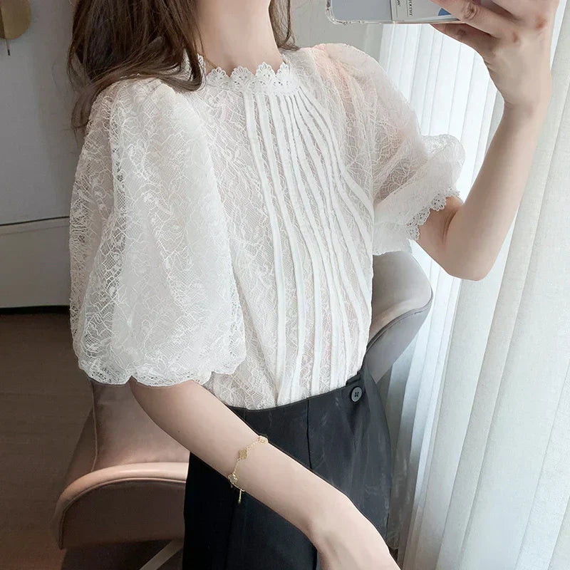 White blouse with stand-up collar and lace