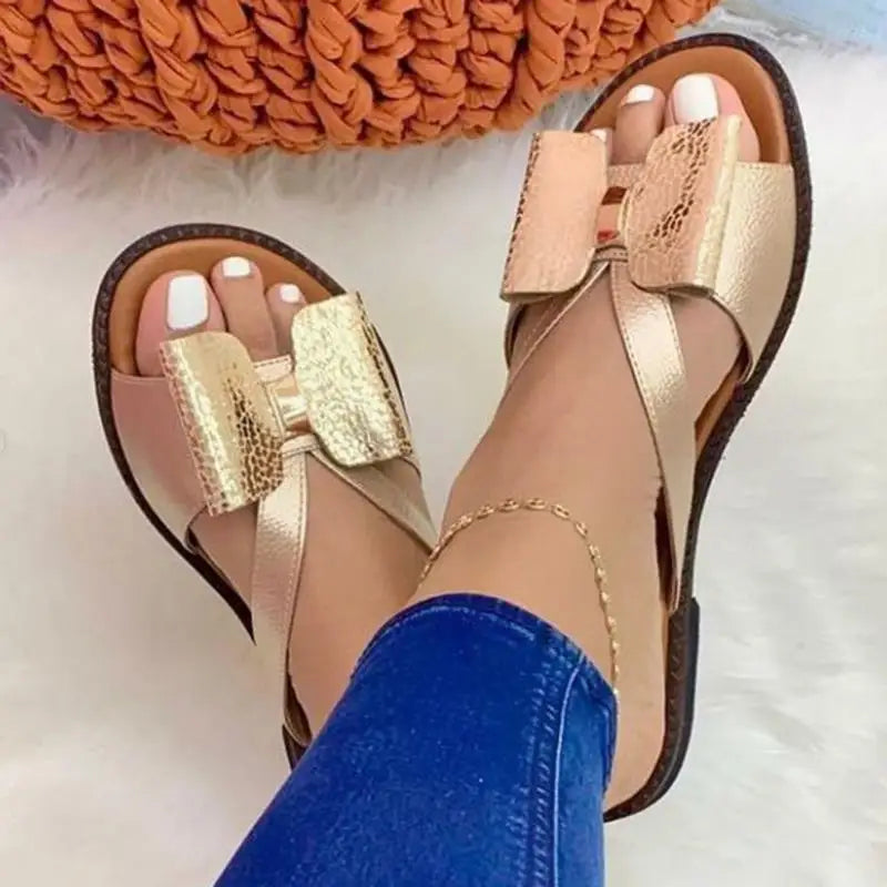 Summery women's sandals with bow and flat heel