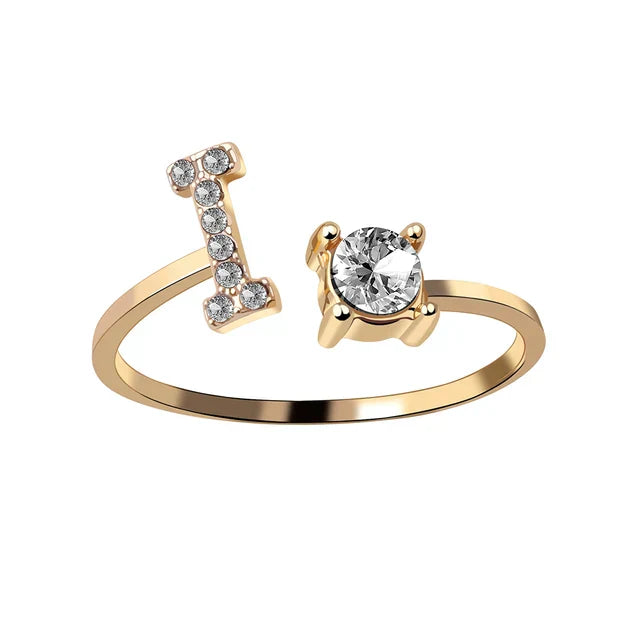 Personalised initial ring with solitaire diamond