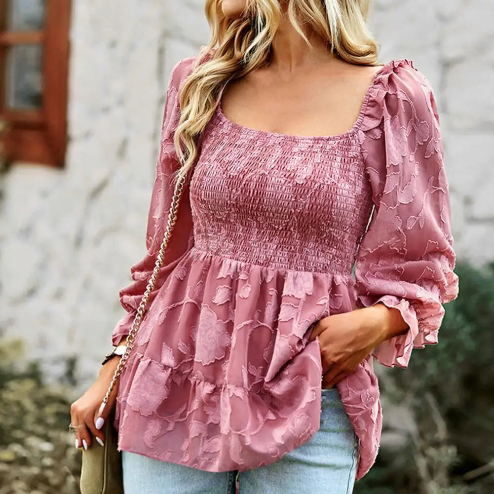 Ruffled blouse with a square neckline and sheer sleeves